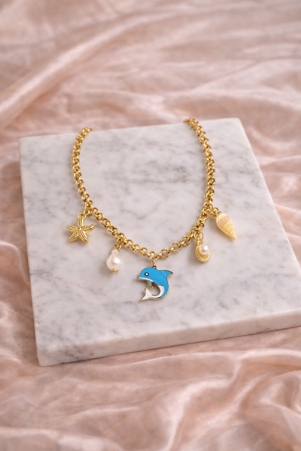 Charm Necklace Dolphin Pendant | Lumera Charm necklace with dolphin starfish shell and pearl pendants by Lumera