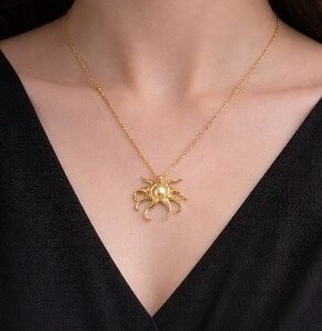 Gold octopus pendant charm necklace on delicate chain by Lumera