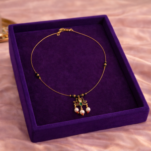 Invisible mangalsutra with lotus pendant pearl drops and black beads by Lumera