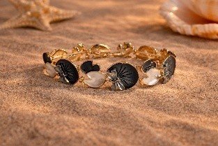 Gold black and white shell flower bracelet with matching cream flower stud earrings by Lumera flowers bracelet black+white flower earrings