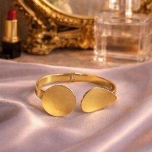 Gold oval and petal shape open cuff kada bracelet by Lumera