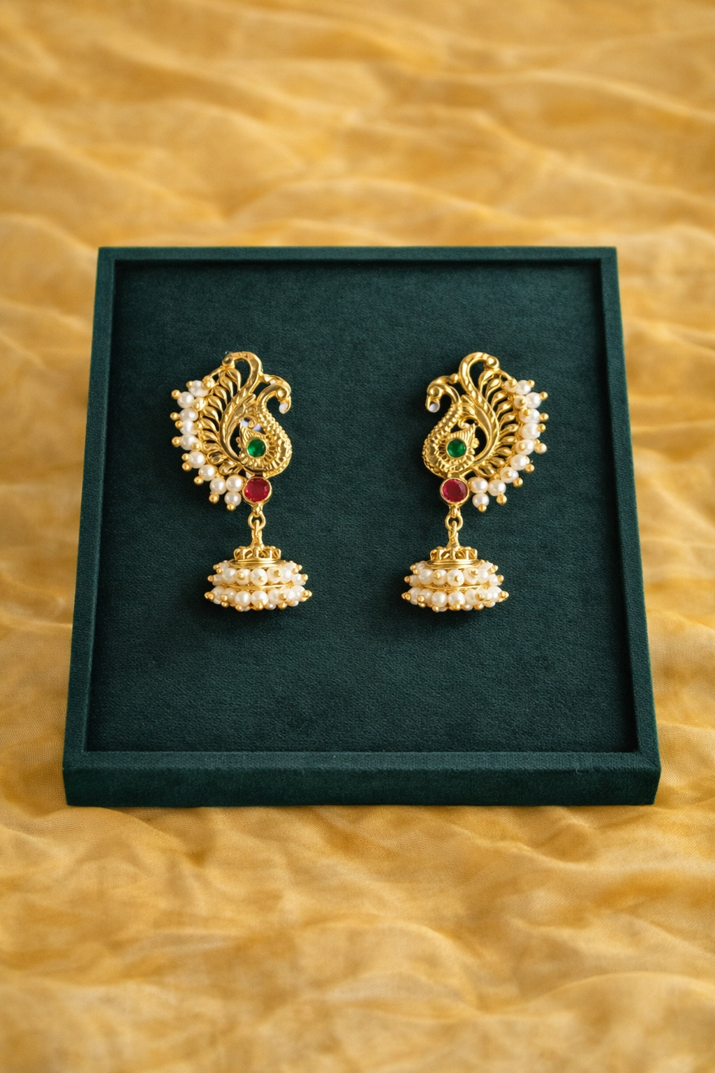 Peacock Moti Jhumka – Gold Pearl Traditional Jhumka Earrings | Luméra Gold peacock moti jhumka earrings with ruby and emerald stones and pearl – Luméra
