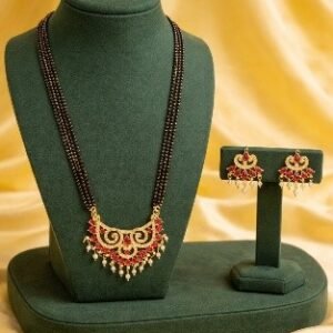Long 4-line black bead mangalsutra with pink kundan pendant and matching earrings – Luméra