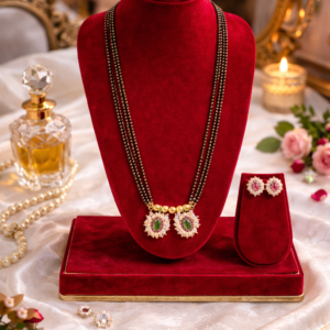 Moti mangalsutra with triple black bead chain emerald pendant and matching earrings by Lumera